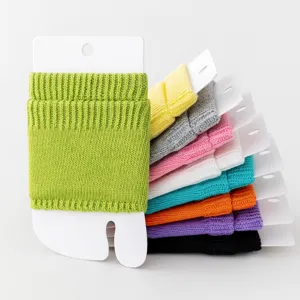 Colorful knit split-toe socks detail showing vibrant candy colors and neat stacking display.