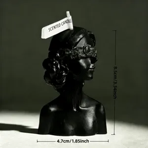 Black blindfolded female bust scented candle detail view, elegant home decor fragrance candle.