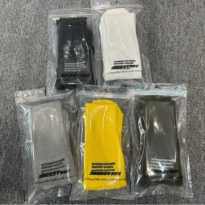 Casual letter print mid-tube socks for men and women, simple Japanese style daily wear.