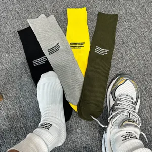 Fall winter casual thick knit socks with letters print, comfortable mid-tube socks for daily wear.