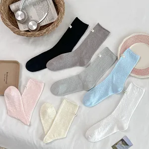 Damen koreanische Stil Baumwollsocken mittelhoch mit Stoffetikett atmungsaktiv Fruehling.