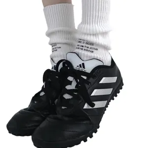 Casual cotton mid-calf socks with letter prints, stylish retro design for men and women daily wear.