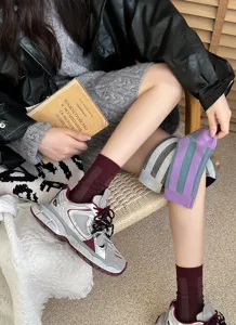 Cozy colorblocked vertical striped mid-tube socks for autumn and winter fashion style.