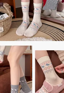 Detailed view of retro Fair Isle mid-calf socks featuring cute dog patterns and cozy fabric.