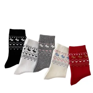 Retro Fair Isle knit socks for women featuring cute puppy patterns, cozy mid-calf length design.
