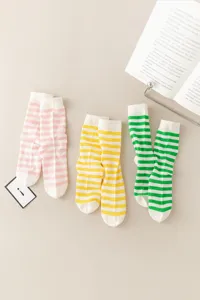 Detailed view of breathable striped mid-calf socks in candy colors, sweet and vintage style.