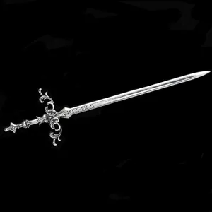 Detailed shot of retro silver metal sword hairpin, exquisite engraved cross hilt design accessory.