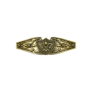 Vintage bronze metal hair barrette detail, medieval shield and fleur-de-lis carved spring clip.