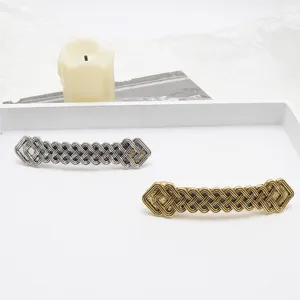 Retro Viking style metal hair barrette set with woven texture and secure spring clip design.