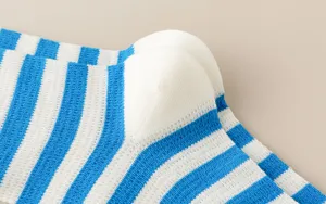 Detailed close-up view highlighting the blue and white striped breathable mesh sock heel part structure.