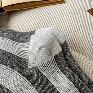 Knitted vertical striped socks detail view, color-blocked cotton blend casual socks for autumn.