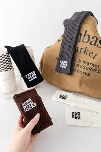 Autumn winter distressed ribbed calf socks detail view, cozy embroidery design socks.