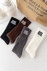 Autumn winter distressed ribbed knit socks with embroidery text, multi-color casual hosiery.