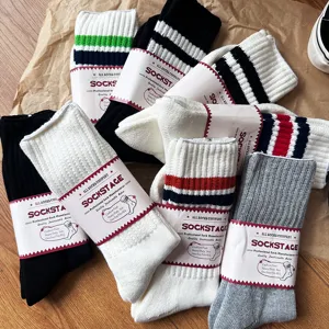 Detailed view of Japanese tooling striped thick cotton long socks with neat packaging bands.