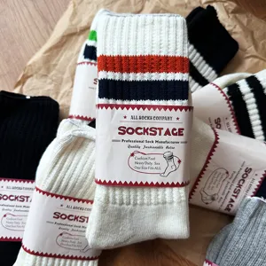 Japanese striped cotton crew socks with vintage paper packaging, thick cushion foot daily wear.
