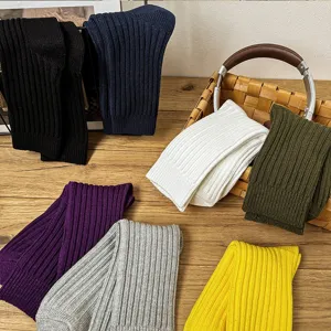 Solid color ribbed mid-calf slouch socks, casual cotton knit socks in various colors.