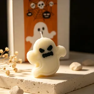 Halloween ghost scented candle detail shot, white spooky candle for party decor and festive gifts.