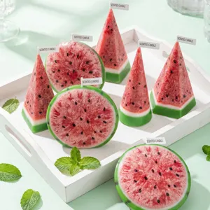 Handmade watermelon scented candles, realistic fruit shape wax decor for summer desktop and gifts.