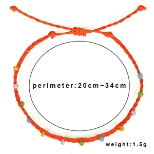 Detail view showing adjustable perimeter and light weight of the beaded bohemian anklet.