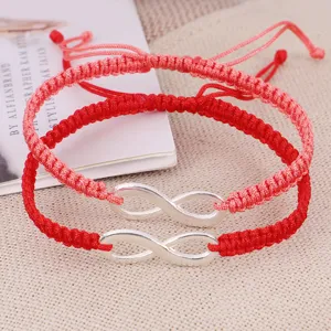 Two handmade braided red and pink infinity bracelets shown as a set.