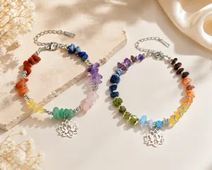Close-up of handmade natural stone yoga bracelets with stainless steel lotus charms