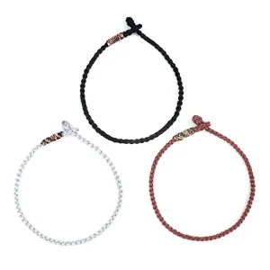 Collection of three hand-woven braided cord bracelets in black, white, and brown tones.