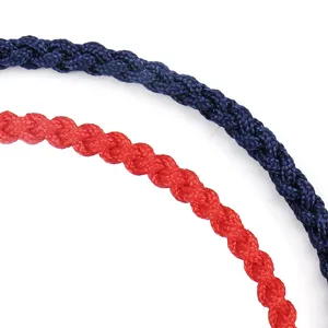 Detailed macro view of red and navy blue handmade braided rope bracelets texture