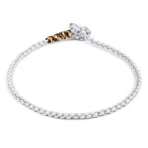 Detailed view of handmade silver-grey braided rope bracelet with colorful thread accents