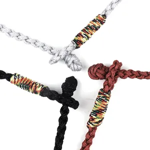 Detailed view of handmade braided rope bracelets in black, gray, and brown colors.
