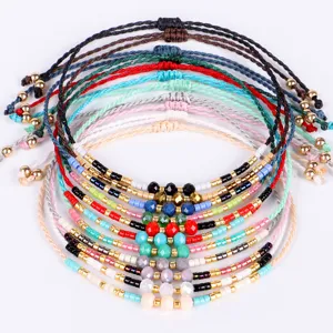 Set di braccialetti in perline tessuti colorati con cordino regolabile per regali d'amicizia