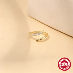 Close-up of elegant gold-plated S925 sterling silver spiral ear cuff with sparkly CZ inlay