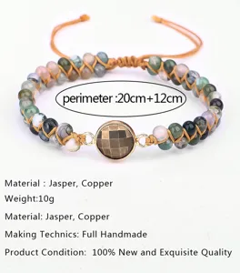 Detail view of handmade jasper and copper beaded wrap bracelet with faceted stone