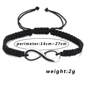 Minimalist black hand-woven infinity symbol bracelet with adjustable friendship knot