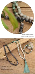 Macro detail of 108 bead African turquoise yoga necklace and bracelet set on wood