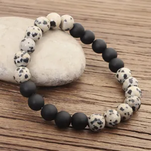 Pulsera elástica de jaspe dálmata y cuentas negras mate para yoga y zen