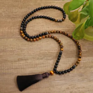 Collana Mala da Yoga con 108 grani in occhio di tigre e pietra nera e nappa marrone
