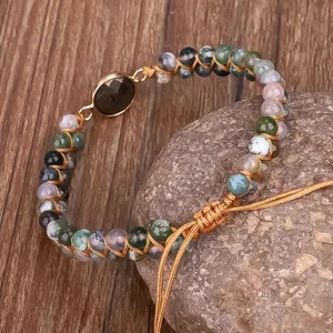 Detail view of double-layer Indian agate beaded wrap bracelet with faceted stone centerpiece