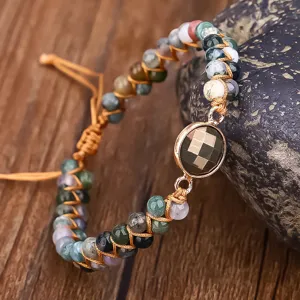 Macro detail of a handmade Indian Agate double layer wrap bracelet with faceted stone