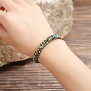 Close-up detail of a hand-woven 4mm African Turquoise stone beaded bracelet on a wrist