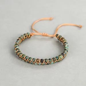 Handmade 4mm African turquoise beaded woven wrap bracelet with adjustable cord.