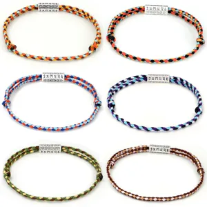 Hand-braided colorful cotton bracelets with engraved Six-Syllable Mantra metal beads