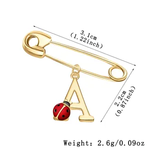 Ladybug letter A brooch detail showing dimensions 3.1cm by 2.2cm and weight 2.6g