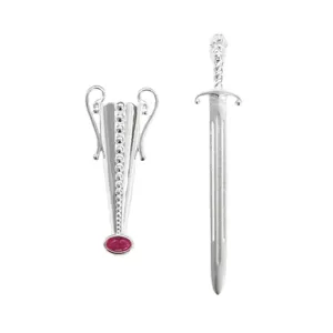 Detailed view of S925 sterling silver sword and vase brooch with red gemstone