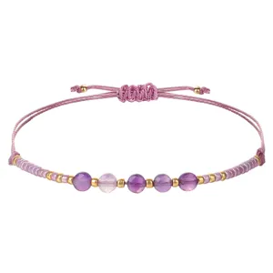 Bracciale fatto a mano con perline viola, pietre sfaccettate e cordino regolabile