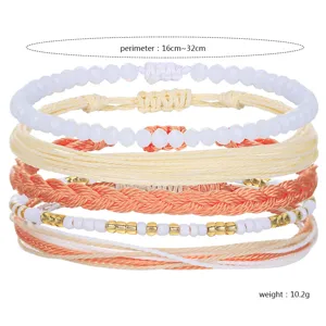 Detailed view of Bohemian handmade wax cord bracelet set featuring beads and crystal accents