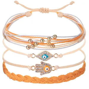 Handgemachtes Wachskordel Armband Set mit bösem Blick und Hamsa Hand für modische Damen