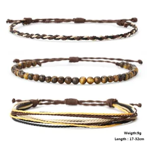 Detail of handmade 3pcs braided wax cord and tiger eye stone beaded bracelet set
