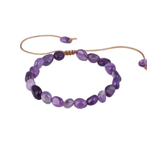 Bracciale artigianale da donna con pietre di ametista irregolari e cordino regolabile