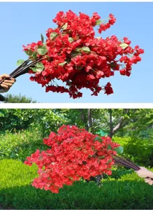 Detailed view of vibrant red artificial bougainvillea branches for wedding floral decor.
