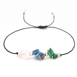 Bracciale regolabile in cordino nero con scaglie di lapislazzuli e quarzo rosa